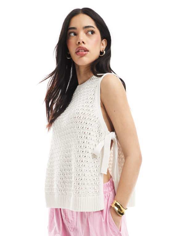 エイソス レディース トップス タンクトップ ベスト ニット ASOS DESIGN crochet knit tabard vest with tie sides in ecru ECRU エクリュ