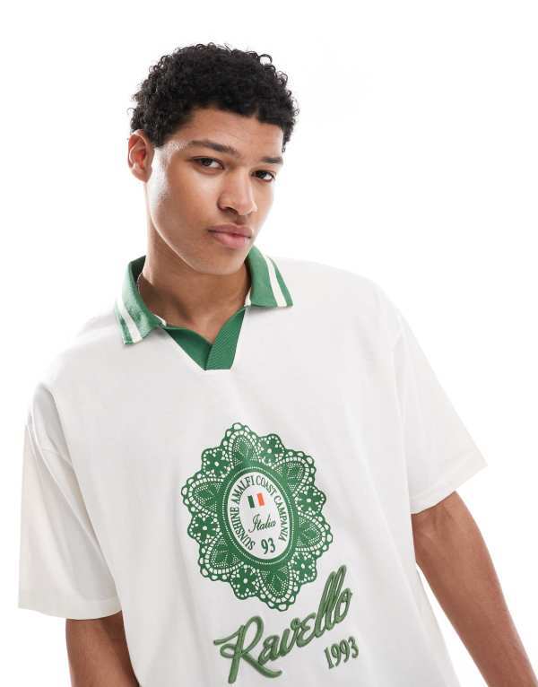 エイソス メンズ トップス ポロシャツ プリント シャツ ASOS DESIGN oversized polo shirt with city print in off-white Coconut milk オフホワイト