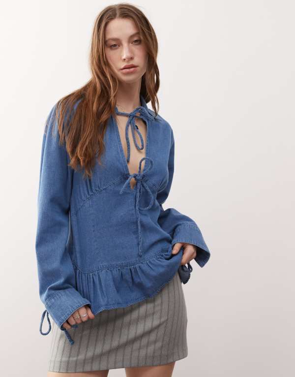 リクレイム ヴィンテージ レディース トップス シャツ デニム Reclaimed Vintage long sleeve denim tie front top with peplum hem in mid Denim デニム