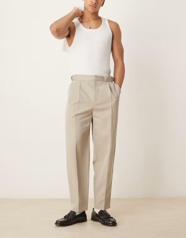 エイソス メンズ ボトムス カジュアルパンツ ワイドレッグ プリーツ パンツ ASOS DESIGN wide leg front pleated dress pants with side adjusters in stone Gray グレー