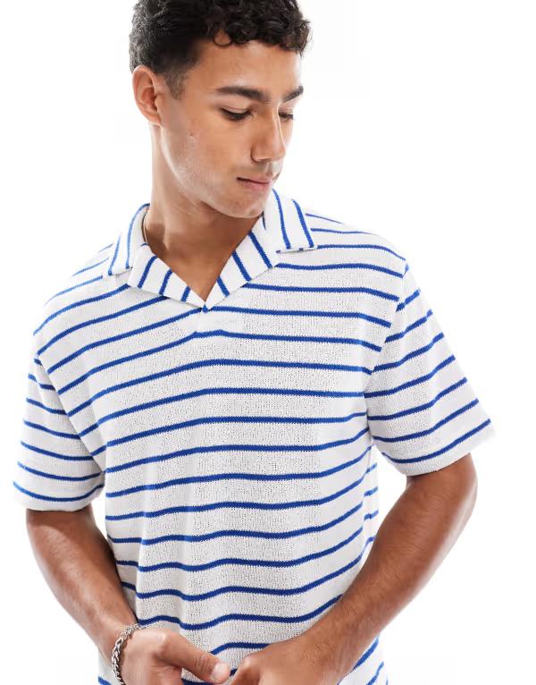 エイソス メンズ トップス ポロシャツ ASOS DESIGN relaxed polo shirt with camp collar in textured blue and white stripes Multi マルチカラー