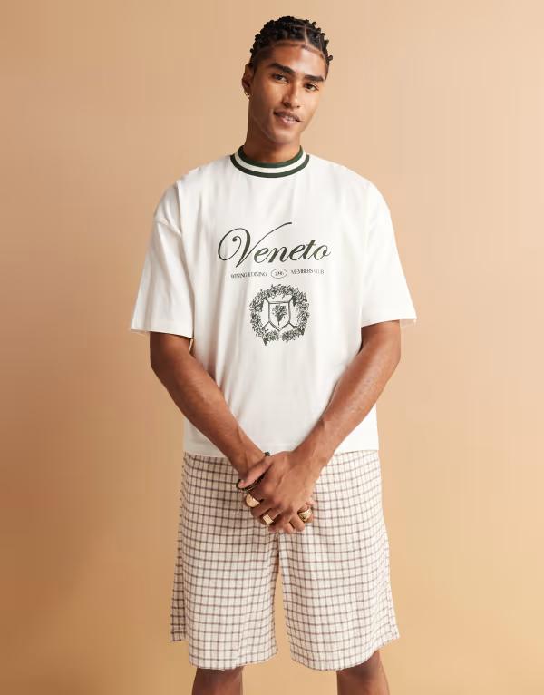 エイソス メンズ トップス Tシャツ グラフィック ASOS DESIGN boxy oversized t-shirt with city graphic Coconut milk オフホワイト