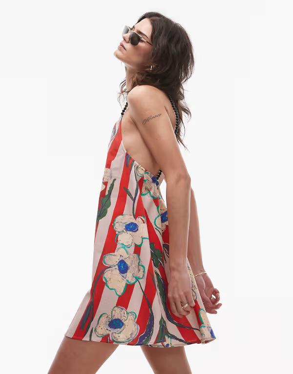 トップショップ レディース トップス ワンピース ミニワンピース フラワー柄 プリント ミニ フラワー Topshop beaded strap printed flippy mini dress and floral stripe Multi マルチカラー