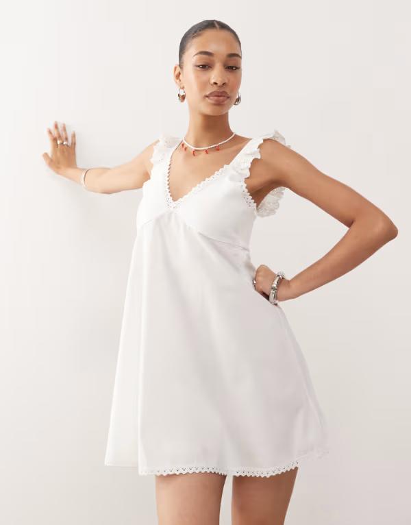 リクレイム ヴィンテージ レディース トップス ワンピース ミニワンピース ミニ レース Reclaimed Vintage babydoll poplin cami mini dress with eyelet and lace trims in cream Cream クリーム 13,665円