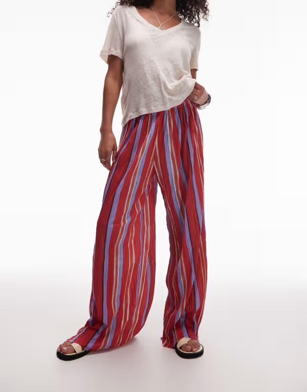 トップショップ レディース ボトムス カジュアルパンツ ワイドレッグ パンツ Topshop striped crinkle wide leg pants and lilac red and lilac レッド