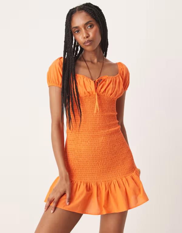 エイソス レディース トップス ワンピース ミニワンピース ミニ ASOS DESIGN off the shoulder tie front shirred mini dress in orangeオレンジ