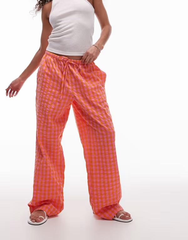 トップショップ レディース ボトムス カジュアルパンツ パンツ Topshop pull on plaid pants in orangeオレンジ