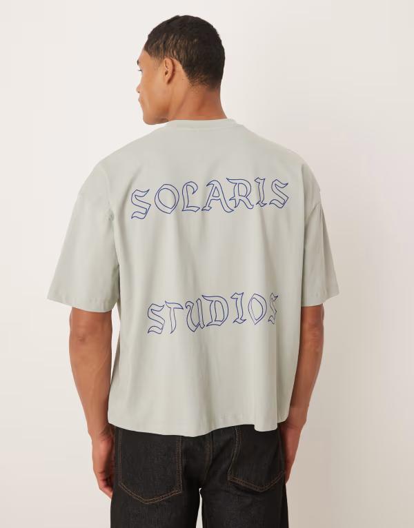 エイソス メンズ トップス Tシャツ グラフィック ASOS DESIGN boxy oversized T-shirt with front and back text graphic in light Belgian block グレー