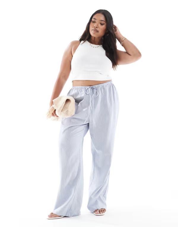 オンリーカーブ レディース ボトムス カジュアルパンツ ワイドレッグ パンツ ONLY Curve side tie wide leg pants in light blue stripes WHITE ホワイト｜ReVida 店