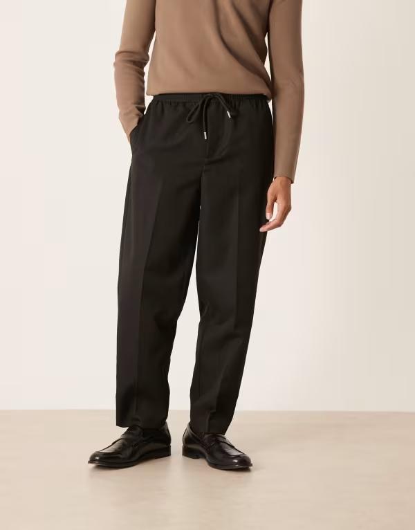 エイソス メンズ ボトムス 心地よいズボン下 ズボン下 ASOS DESIGN carrot fit pants with elasticated waistband Black 黒いこと