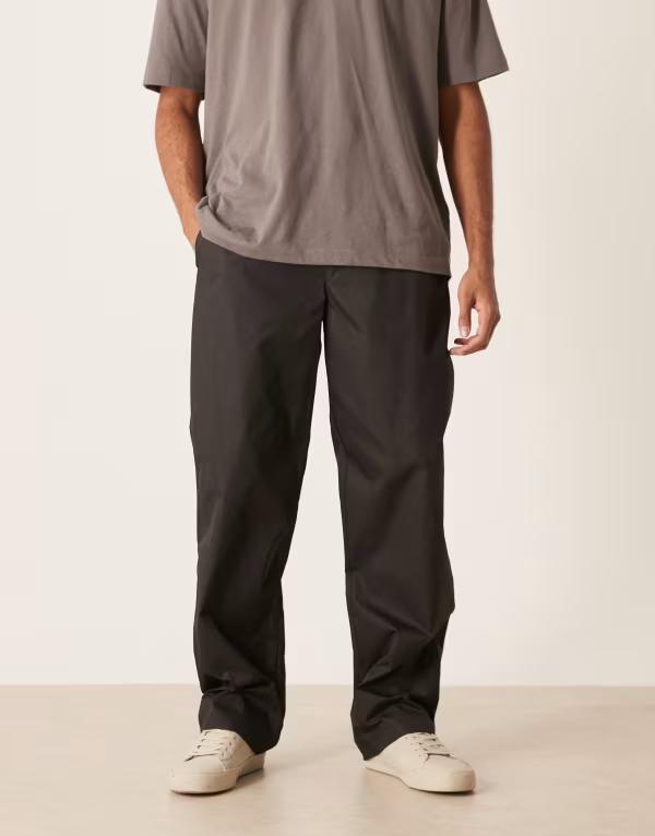 エイソス メンズ ボトムス 心地よいズボン下 ナイロン ズボン下 ASOS DESIGN baggy nylon pants with back pocket detail Black 黒いこと