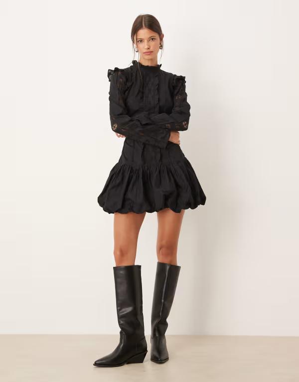 エイソス レディース トップス 衣装 ハイネック ミニ衣装 フラウンス ミニ スコート ASOS DESIGN high neck dropped waist mini dress with ruffles and puff skirt Black 黒いこと