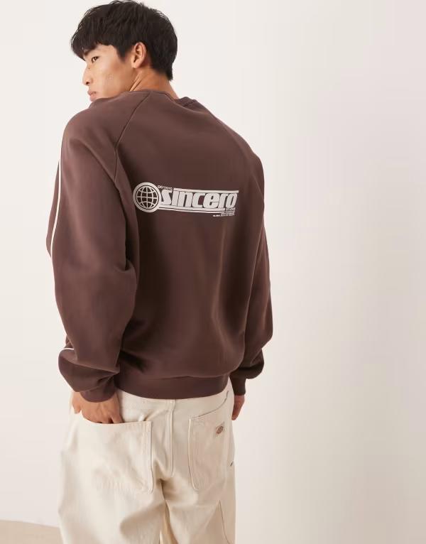 エイソス メンズ アウター パーカー・スウェット プリント シャツ ASOS DESIGN sweatshirt with sporty print shopping cart ブラウン