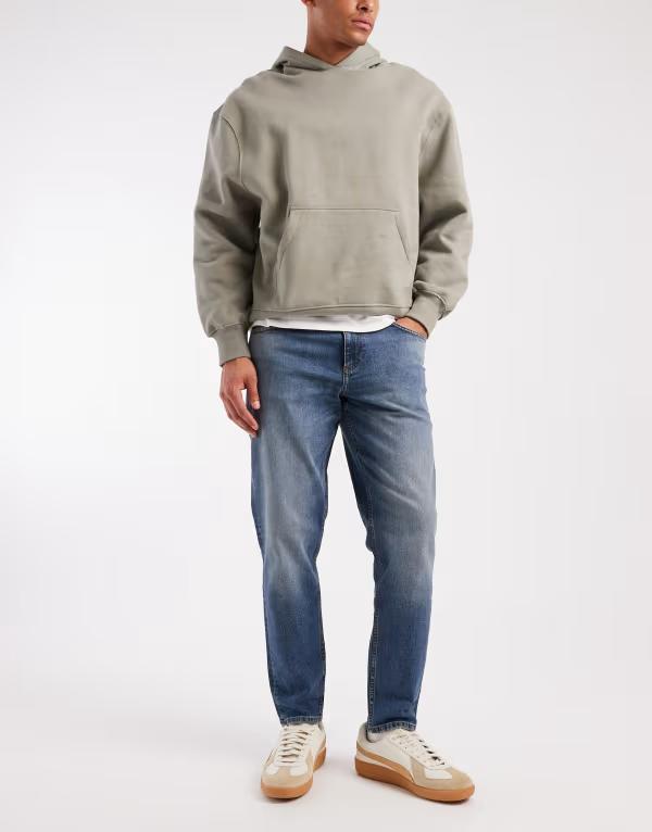 エイソス メンズ ボトムス ジーンズズボン下 デニム ASOS DESIGN tapered jeans インチ mid wash blue with tint Mid wash blue 青色