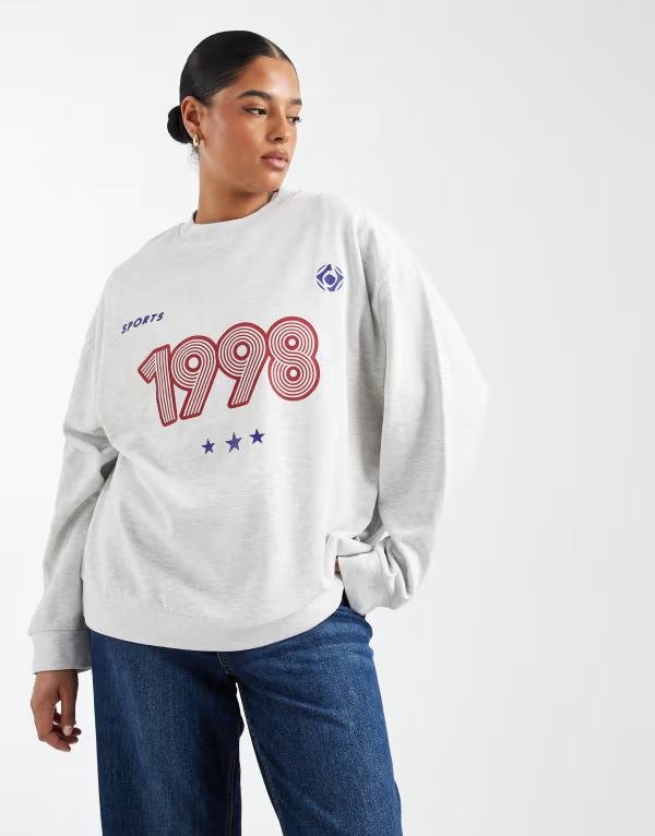 エイソス レディース アウター パーカー・スウェット シャツ グラフィック ASOS Curve ASOS DESIGN Curve oversized sweatshirt with 1998 sports graphic in heathered ice Marl マール