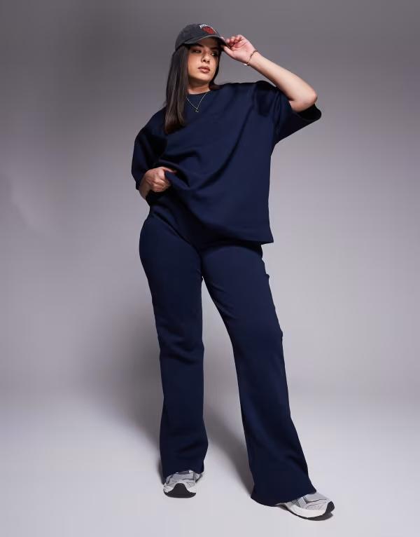 エイソス レディース ボトムス カジュアルパンツ スウェットパンツ ASOS Curve ASOS DESIGN Curve interlock flared sweatpants - part of a set NAVY ネイビー