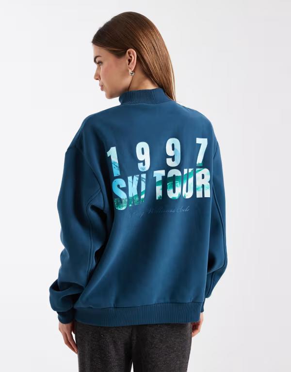 コットンオン レディース アウター パーカー・スウェット モックネック プラスサイズ シャツ グラフィック Cotton plush mock neck sweatshirt with ski tour graphic in tidal teal Tidal teal ティール