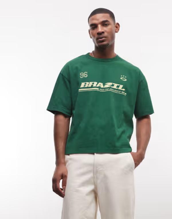 エイソス メンズ トップス Tシャツ グラフィック ASOS DESIGN boxy oversized t-shirt with Brazil graphic in washed Formal garden グリーン