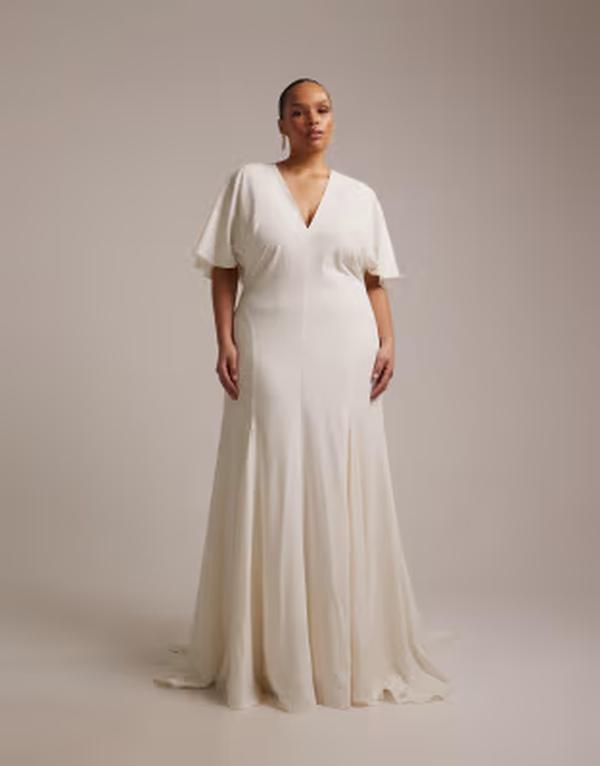 エイソス レディース トップス ワンピース ケープデザイン キャップ ケープ マキシ ASOS Curve ASOS DESIGN Curve bridal cape sleeve godet maxi dress Ivory アイボリー