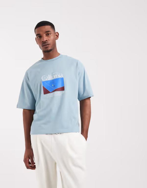 エイソス メンズ トップス Tシャツ グラフィック ASOS DESIGN boxy oversized t-shirt with tennis graphic Stone blue ブルー