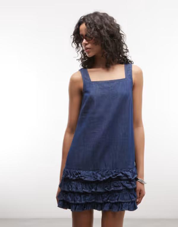 リクレイム ヴィンテージ レディース トップス ワンピース フリル ミニ デニム Reclaimed Vintage denim camini dress with ruffle details in mid Blue ブルー|ReVida 店