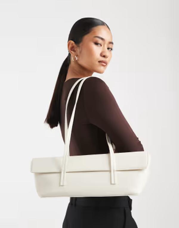 グラマラス レディース バッグ Glamorous elongated shoulder bag in cream クリーム