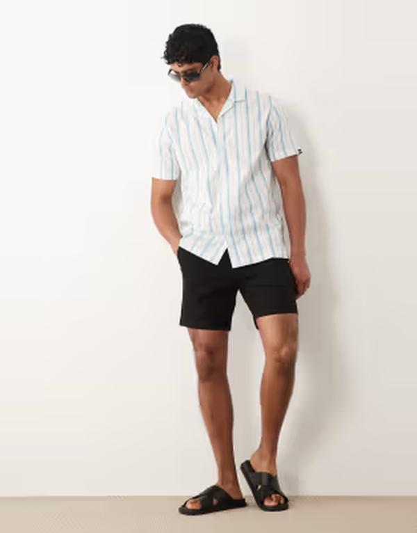 エイソス メンズ ボトムス ハーフパンツ・ショーツ スリムフィット ショートパンツ ASOS DESIGN slim fit chino shorts in mid length Black ブラック 10,205円