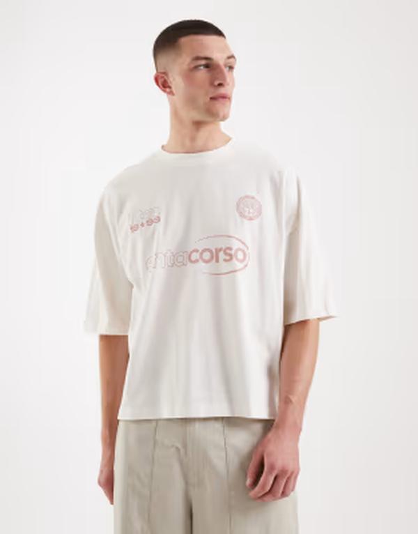 エイソス メンズ トップス ティーシャツ グラフィック ASOS DESIGN boxy oversized t-shirt with soccer graphicoconut milk 象牙色