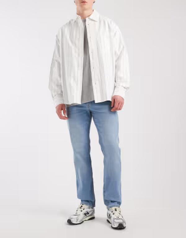 ジャック アンド ジョーンズ メンズ ボトムス デニムパンツ レギュラーフィット ジーンズ Jack & Jones Clark regular fit jeans in mid Blue ブルー|ReVida 店