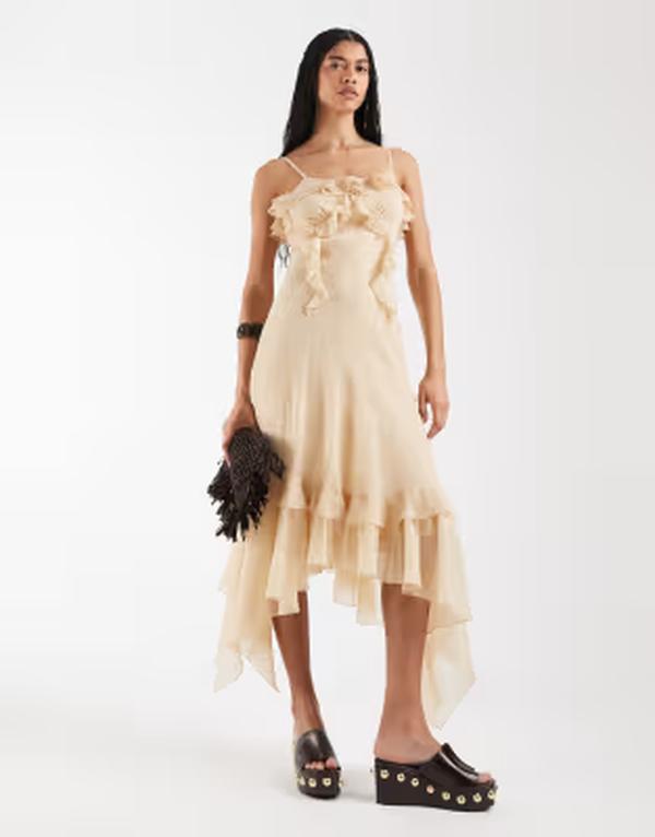 リクレイム ヴィンテージ レディース トップス ワンピース アシンメトリー フリル マキシ Reclaimed Vintage maxi dress with ruffle details and asymmetric hem in cream クリーム|ReVida 店