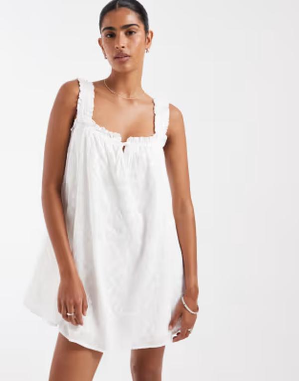 キスザスカイ レディース トップス 衣装 Kiss The Sky eyelet babydoll dress with frilly straps WHITE 白いこと