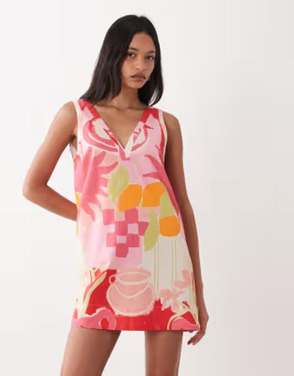 エイソス レディース トップス 衣裳 Vのど首 刷り上げる ミニ 綿織物 リネン ASOS DESIGN cotton linen v neck smock mini dress fruit print Pink Fruit Print さくら色