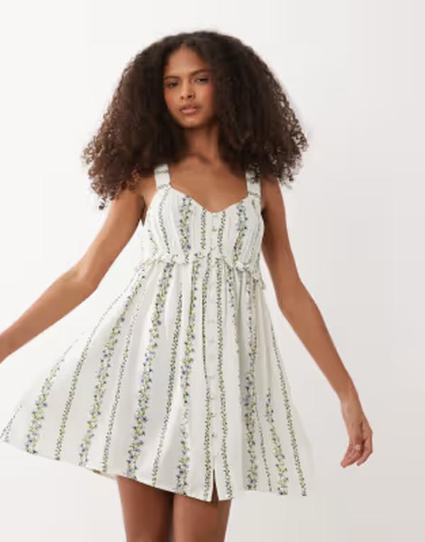 ウェンズデーガール レディース トップス 衣装 御花柄 ミニ 御花 Wednesday\u0027s Girl floral mini dress WHITE 白いこと