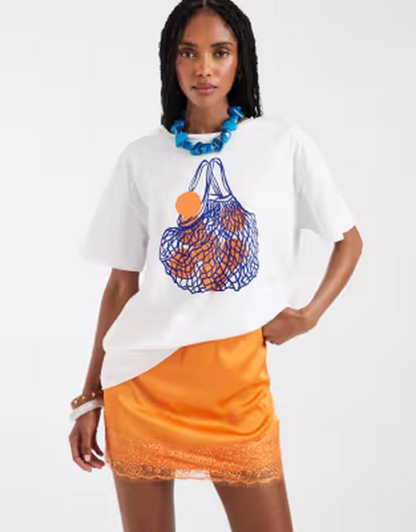 ピーシーズ レディース トップス ティーシャツ グラフィック PIECES oversized shopping bagraphic T-shirt WHITE 白いこと