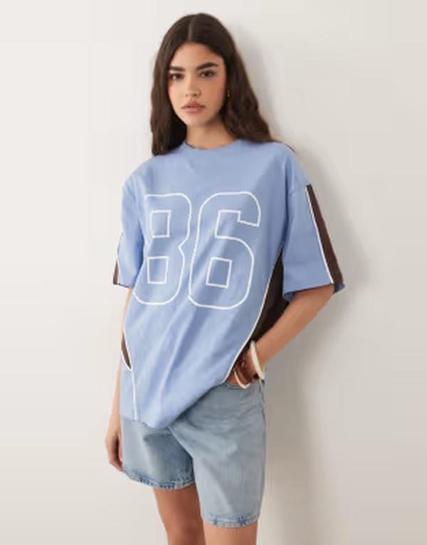 エイソス レディース トップス Tシャツ グラフィック ASOS DESIGN oversized graphic football tee in light BLUE ブルー｜ReVida 店