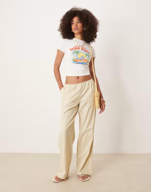 ライオネス レディース ボトムス カジュアルパンツ ワイドレッグ ローライズ Lioness low rise wide leg poplin pants in yellow stripe BEIGE ベージュ｜ReVida 店