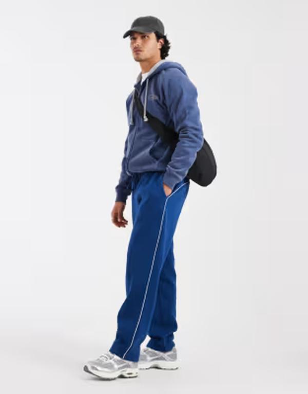 エイソス メンズ ボトムス 心地よいズボン下 引っ切り無い スウェットパンツ ASOS DESIGN straight leg sweatpants with piping Estate blue 青色