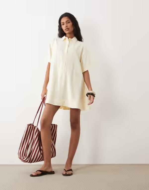 エイソス レディース トップス ワンピース ミニ ASOS DESIGN techy fabric relaxed short sleeve mini dress in buttermilk yellow Buttermilk yellow イエロー｜ReVida 店 15,036円