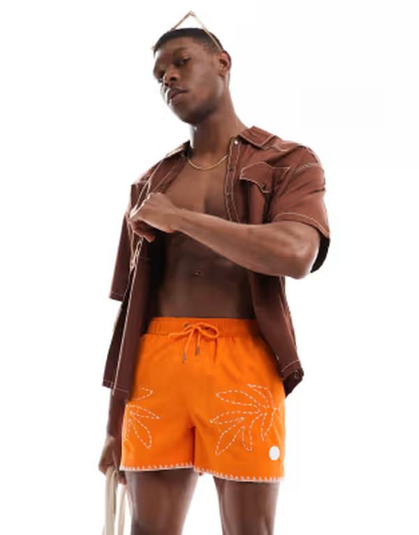 ネイティブユース メンズ 水着 ハーフパンツ・ショーツ プリント ショートパンツ Native Youth embroidery print swim shorts in orange オレンジ｜ReVida 店