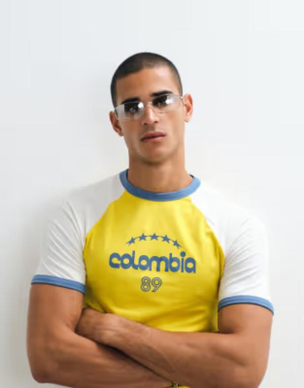 エイソス メンズ トップス Tシャツ グラフィック ASOS DESIGN muscle fit ringer t-shirt with Colombia graphic in cream Passion Fruit クリーム｜ReVida 店