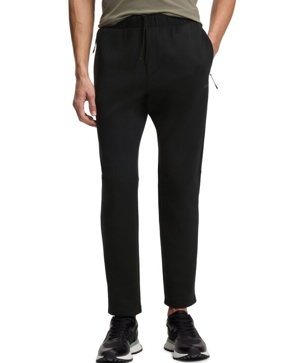 ヒューゴボス メンズ ボトムス カジュアルパンツ トラックスーツ Hugo Boss Men's Reflective Details Regular-Fitracksuit Pants Black ブラック