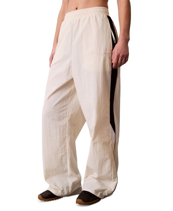 カルバンクライン レディース ボトムス カジュアルパンツ トラックパンツ Calvin Klein Performance Women's Icon Sport Wide-Leg Track Pants Off White/Black オフホワイト｜ReVida 店