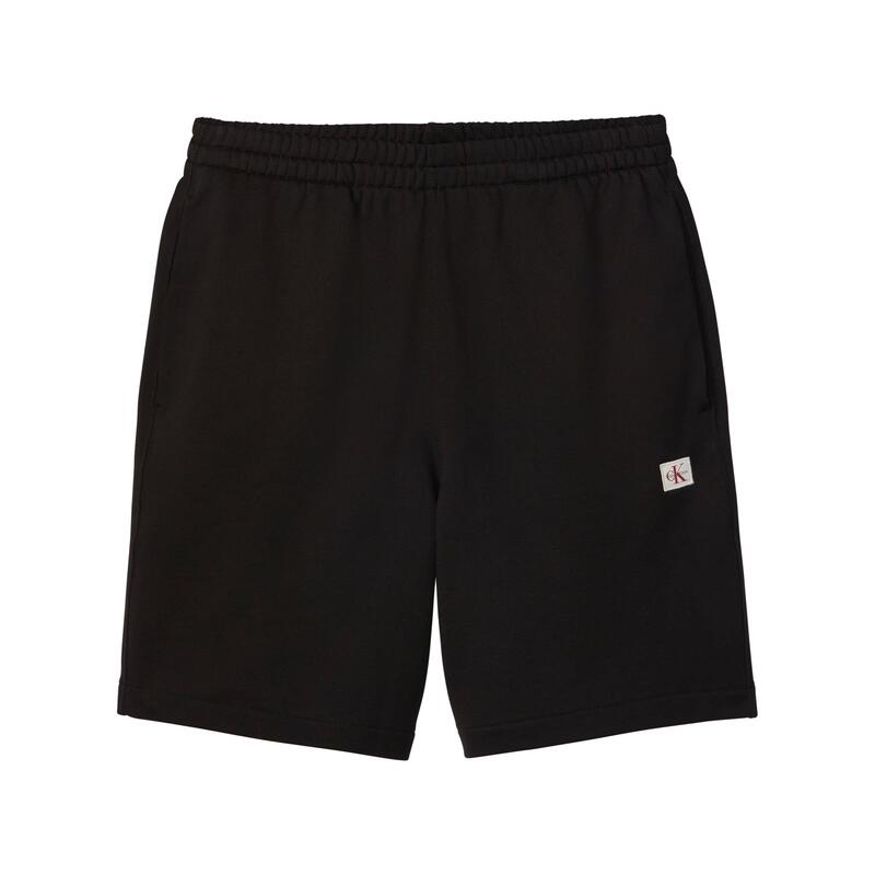 カルバンクライン メンズ ボトムス カジュアルパンツ ショートパンツ フリース Calvin Klein Jeans Men's Woven Badge Fleece Jogger Shorts Black ブラック