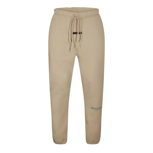 フィアオブゴッド メンズ ボトムス カジュアルパンツ スリムフィット ジョガーパンツ Fear Of God Essentials Men'slim Fit Joggers Beige ベージュ｜ReVida 店