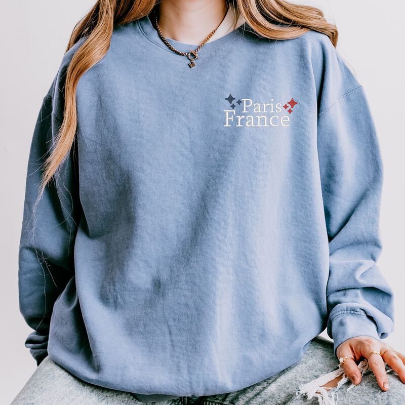 Simply Sage Market レディース トップス プルオーバー 汗水 刺しゅう Simply Sage Market Embroidered Paris France Stars Lightweight Garment Dyed Sweatshirt Blue Jean 青色