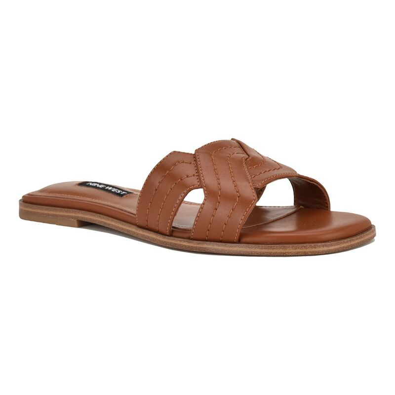 ナインウェスト レディース シューズ サンダル Nine West Gammy Women'square Toe Slip-On Casual Flat Sandals Cognac｜ReVida 店