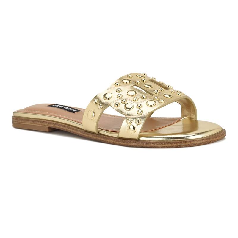 ナインウェスト レディース シューズ サンダル Nine West Gomaz Women'slip-On Casual Sandals Gold ゴールド｜ReVida 店