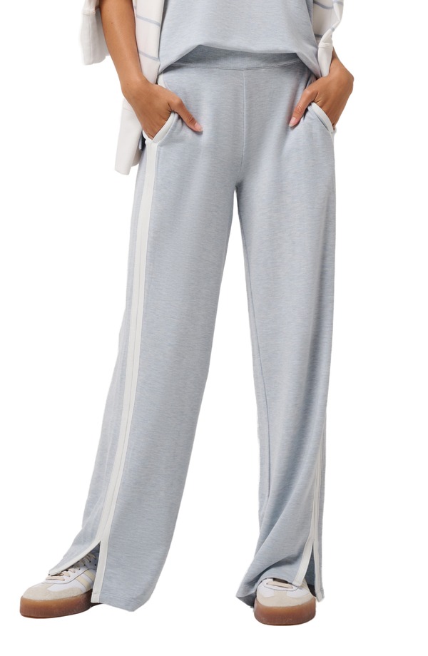トラビスマヒュー レディース ボトムス カジュアルパンツ パイル スウェットパンツ TravisMathew Cloud Terry Side Stripe Varsity Sweatpants Heather Ashley Blue ヘザー｜ReVida 店