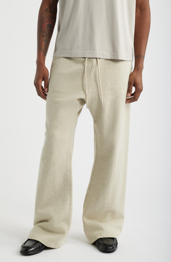 フィアオブゴッド メンズ ボトムス カジュアルパンツ スウェットパンツ Fear of God Essentialsignature Flare Sweatpants WASHED VANILLA HEATHER ヘザー｜ReVida 店