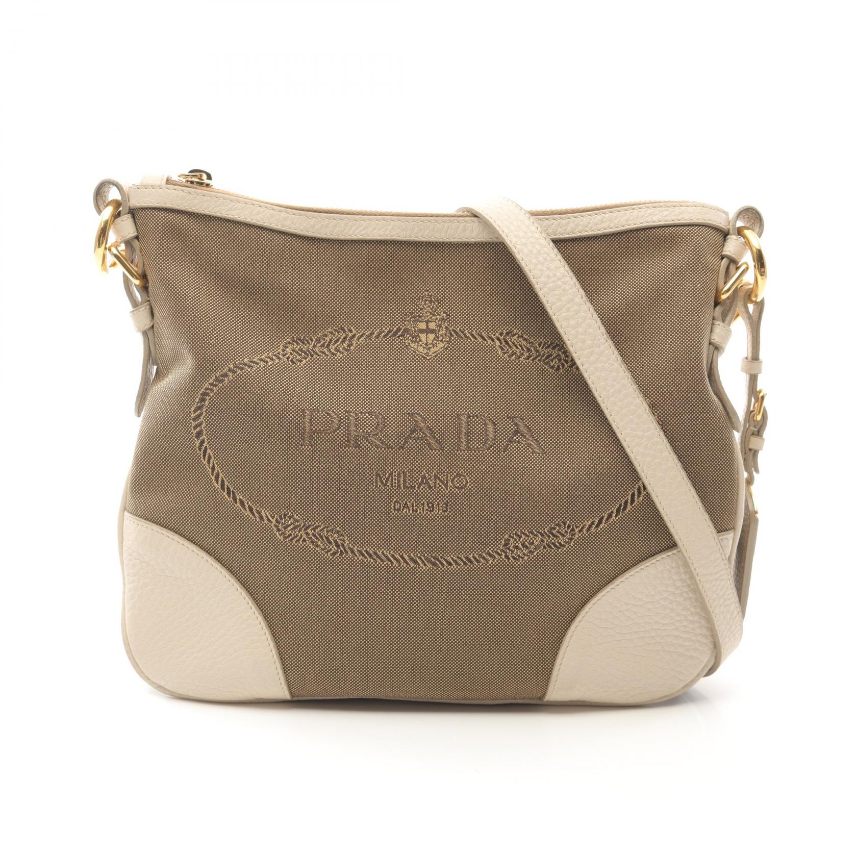 【PRADA】ロゴジャカード プリーツスカート☆SALE中 PRADA(プラダ) / スカート/42/ウール/BLK/無地/三角ロゴプレート